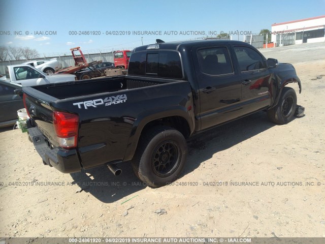 5TFCZ5AN8HX119623 - 2017 TOYOTA TACOMA DBL CAB/SR/TRDSPT/OR/PRO BLACK photo 4