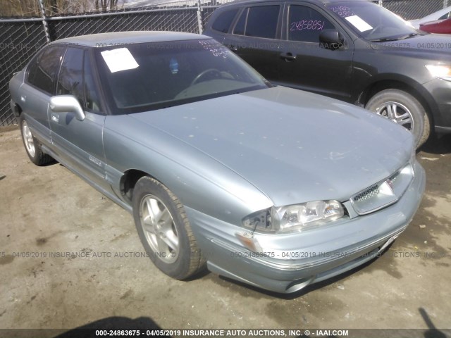 1G2HX52K8VH217884 - 1997 PONTIAC BONNEVILLE SE BLUE photo 1