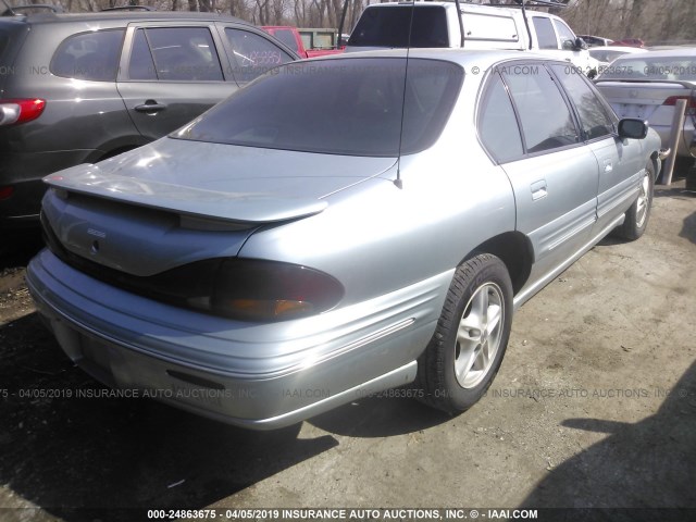 1G2HX52K8VH217884 - 1997 PONTIAC BONNEVILLE SE BLUE photo 4