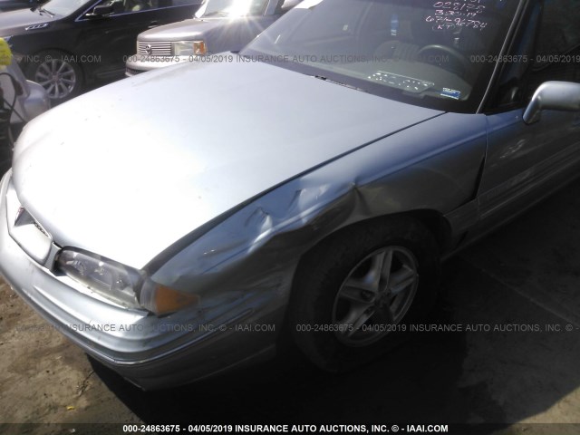 1G2HX52K8VH217884 - 1997 PONTIAC BONNEVILLE SE BLUE photo 6