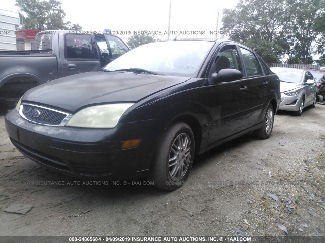 1FAFP34N76W148011 - 2006 FORD FOCUS ZX4 BLACK photo 2