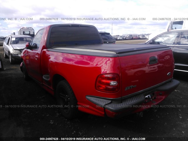 2FTRF07324CA70491 - 2004 FORD F150 SVT LIGHTNING RED photo 3