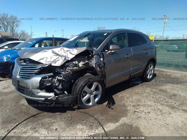 5LMCJ1C90HUL69285 - 2017 LINCOLN MKC PREMIER TAN photo 2