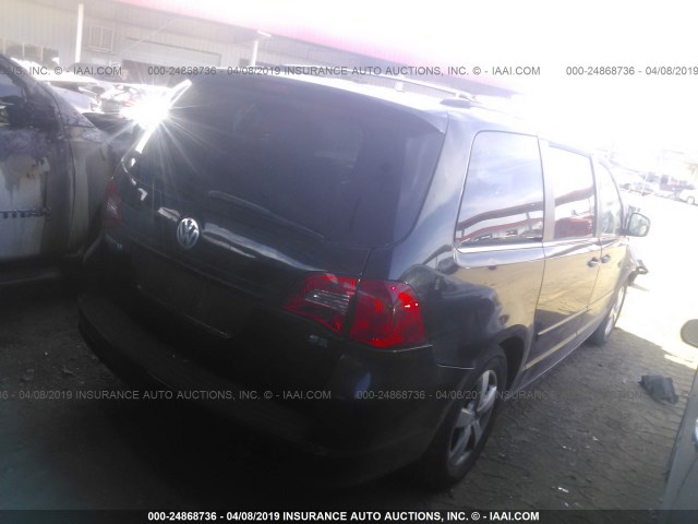 2V8HW34179R560675 - 2009 VOLKSWAGEN ROUTAN SE BLACK photo 4