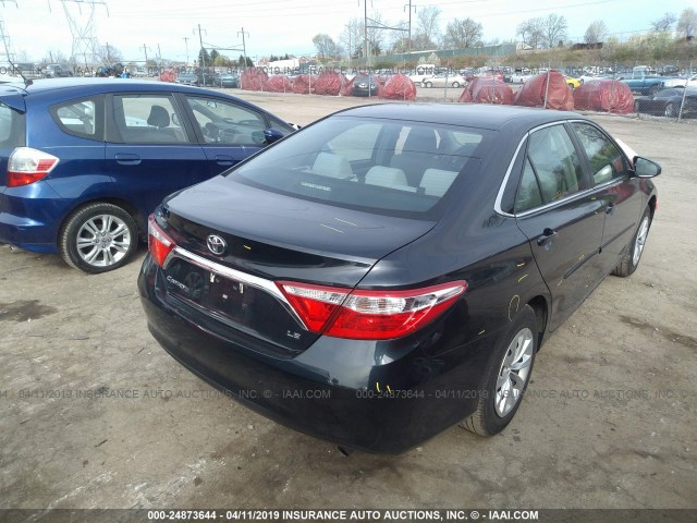 4T1BF1FK4HU764987 - 2017 TOYOTA CAMRY LE/XLE/SE/XSE BLACK photo 4