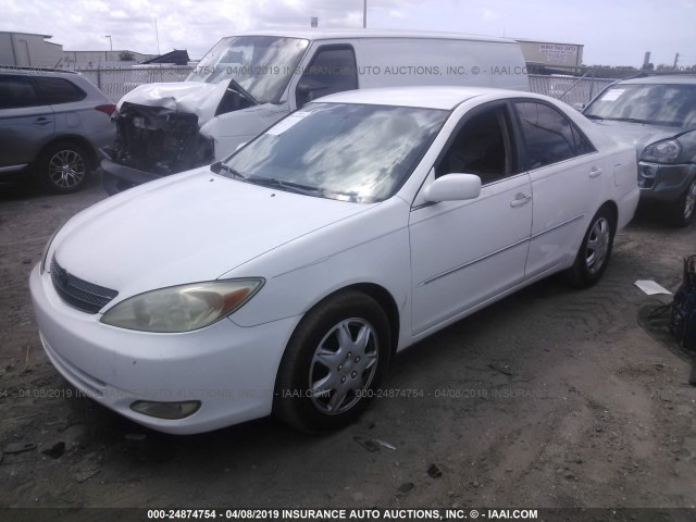 4T1BE32K93U144228 - 2003 TOYOTA CAMRY LE/XLE/SE WHITE photo 2