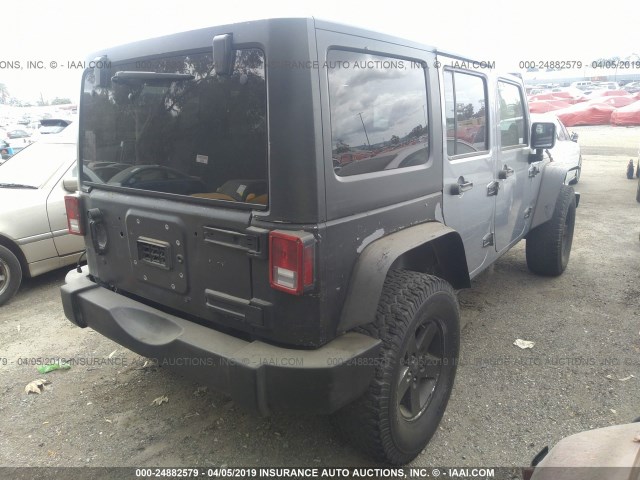 1C4HJWDG7EL221305 - 2014 JEEP WRANGLER UNLIMITE SPORT GRAY photo 4