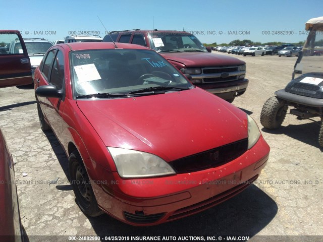 1FAFP34NX6W127914 - 2006 FORD FOCUS ZX4 RED photo 1