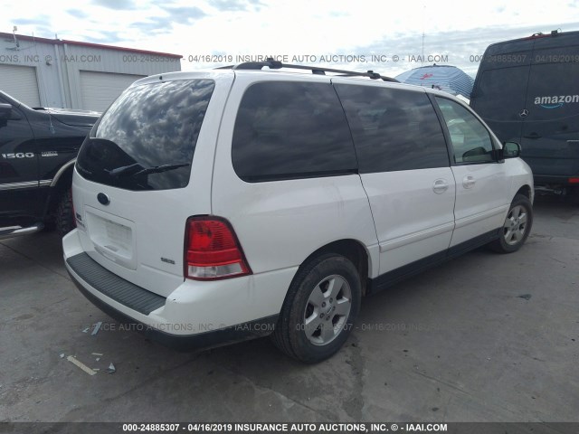 2FMZA57694BA85125 - 2004 FORD FREESTAR SES WHITE photo 4