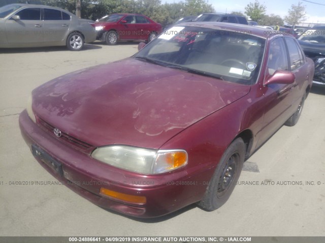 JT2SK12E0S0314549 - 1995 TOYOTA CAMRY LE RED photo 6