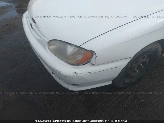 KNAFB121815040795 - 2001 KIA SEPHIA LS WHITE photo 6