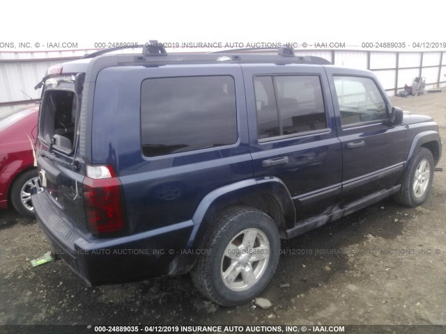 1J8HG48N06C244818 - 2006 JEEP COMMANDER BLACK photo 4