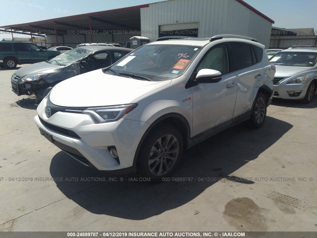 JTMDJREV0GD054747 - 2016 TOYOTA RAV4 HV LIMITED WHITE photo 2