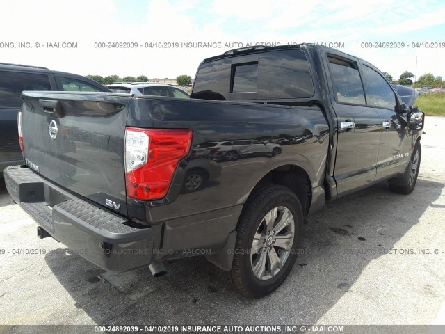 1N6AA1E66JN551359 - 2018 NISSAN TITAN SV/SL/PLATINUM RESERVE BLACK photo 4