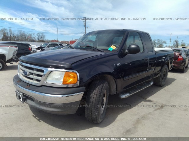 2FTRX17204CA22711 - 2004 FORD F-150 HERITAGE CLASSIC BLUE photo 2