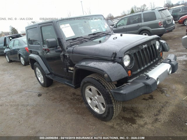 1J8FA54139L730710 - 2009 JEEP WRANGLER SAHARA BLACK photo 1