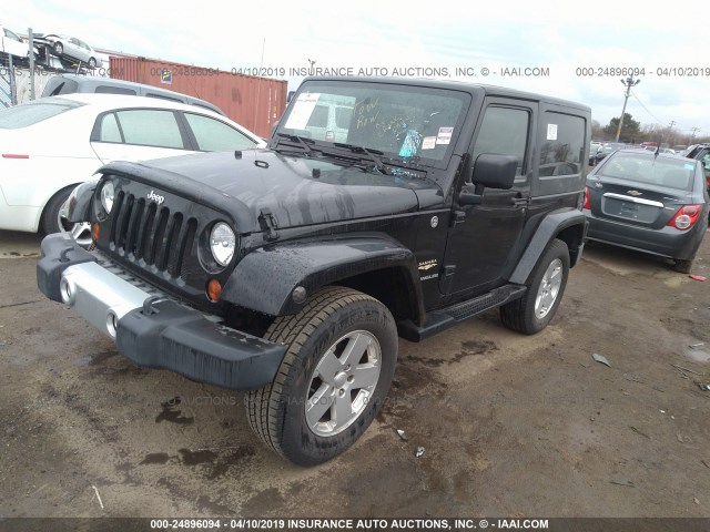 1J8FA54139L730710 - 2009 JEEP WRANGLER SAHARA BLACK photo 2