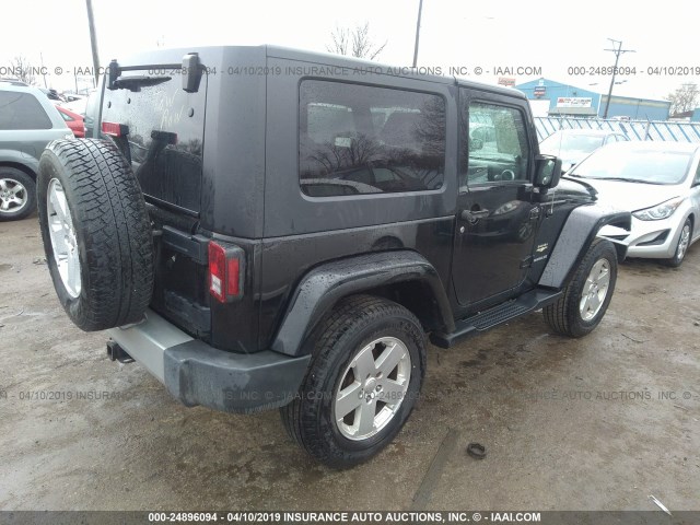 1J8FA54139L730710 - 2009 JEEP WRANGLER SAHARA BLACK photo 4