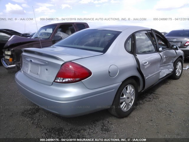 1FAHP56S54A165102 - 2004 FORD TAURUS SEL SILVER photo 4