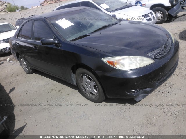 4T1BF32K12U519573 - 2002 TOYOTA CAMRY LE/XLE/SE BLACK photo 1