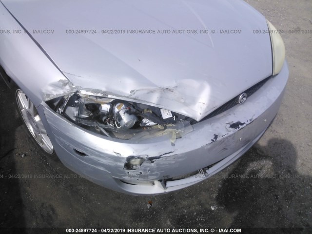 1ZWFT61L225609344 - 2002 MERCURY COUGAR V6/SPORT SILVER photo 6