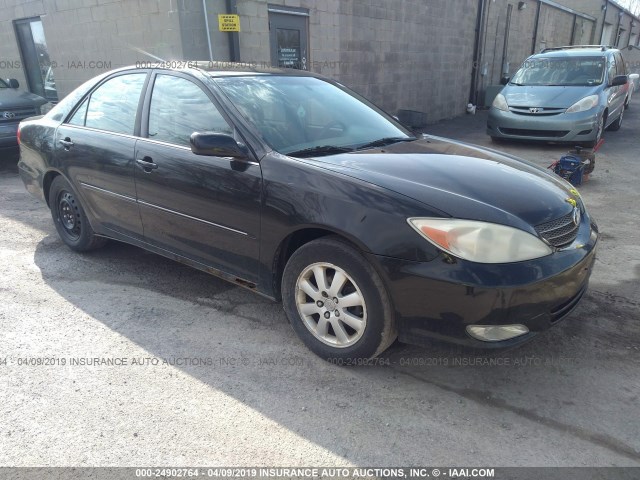 4T1BE32K33U260282 - 2003 TOYOTA CAMRY LE/XLE/SE BLACK photo 1