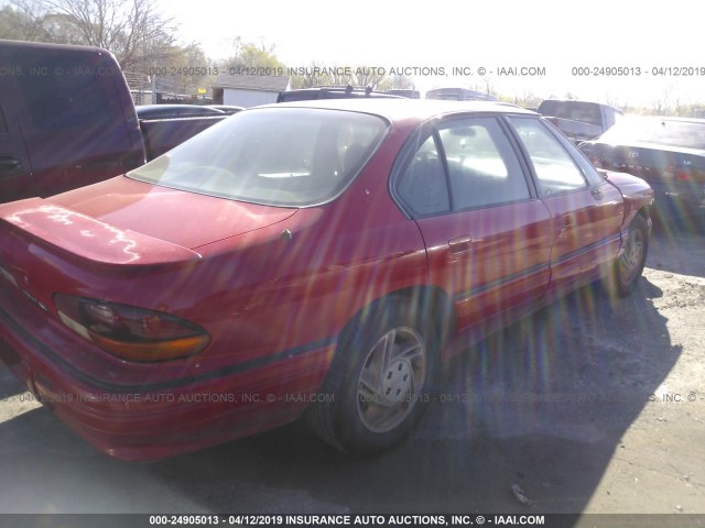 1G2HX53L6P1303861 - 1993 PONTIAC BONNEVILLE SE RED photo 4