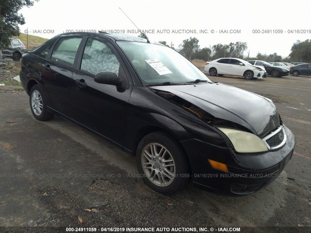 1FAFP34N55W151939 - 2005 FORD FOCUS ZX4 BLACK photo 1