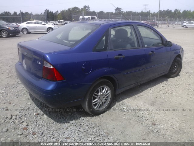 1FAFP34N86W109539 - 2006 FORD FOCUS ZX4 BLUE photo 4