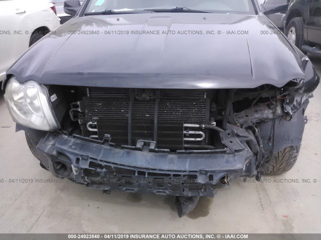 1J8HR78377C508905 - 2007 JEEP GRAND CHEROKEE SRT-8 BLACK photo 6