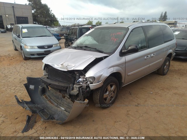 2D4GP44L94R527569 - 2004 DODGE GRAND CARAVAN SXT SILVER photo 2