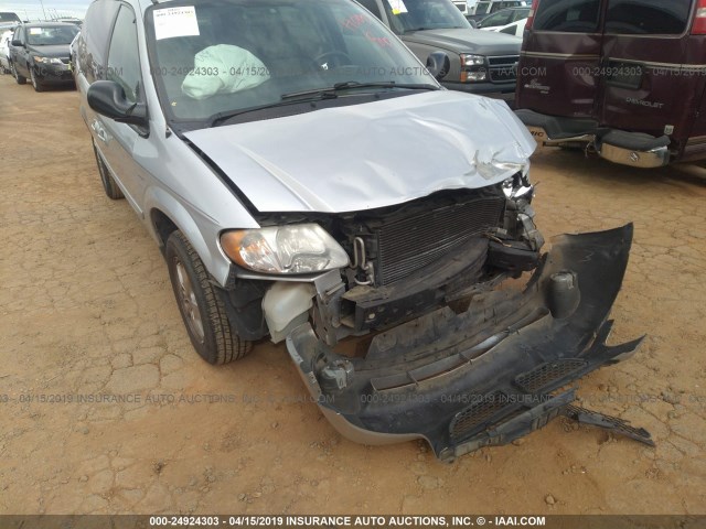 2D4GP44L94R527569 - 2004 DODGE GRAND CARAVAN SXT SILVER photo 6