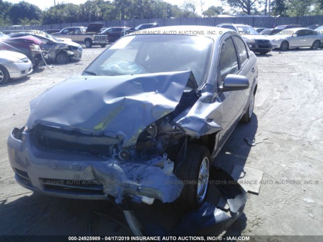 KL1TD5DE7AB125045 - 2010 CHEVROLET AVEO LS/LT GRAY photo 6