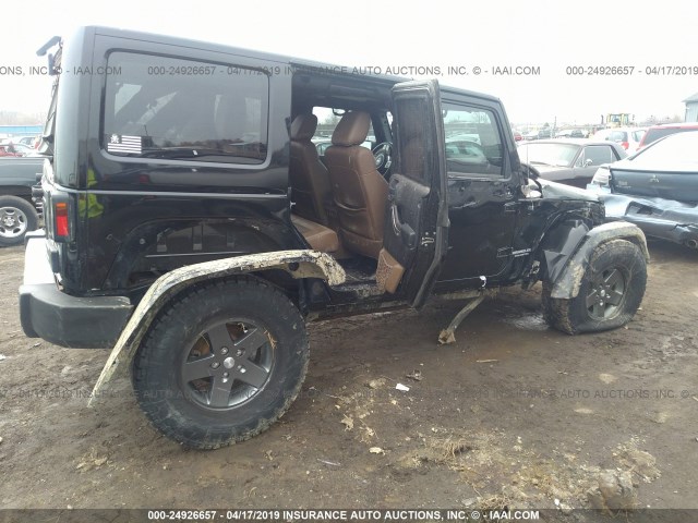 1J4BA3H19BL615713 - 2011 JEEP WRANGLER UNLIMITE SPORT BLACK photo 4