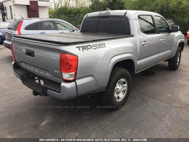 5TFCZ5AN9HX079097 - 2017 TOYOTA TACOMA DBL CAB/SR/TRDSPT/OR/PRO SILVER photo 4