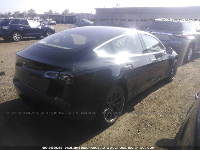 5YJ3E1EA3JF004861 - 2018 TESLA MODEL 3 BLACK photo 4