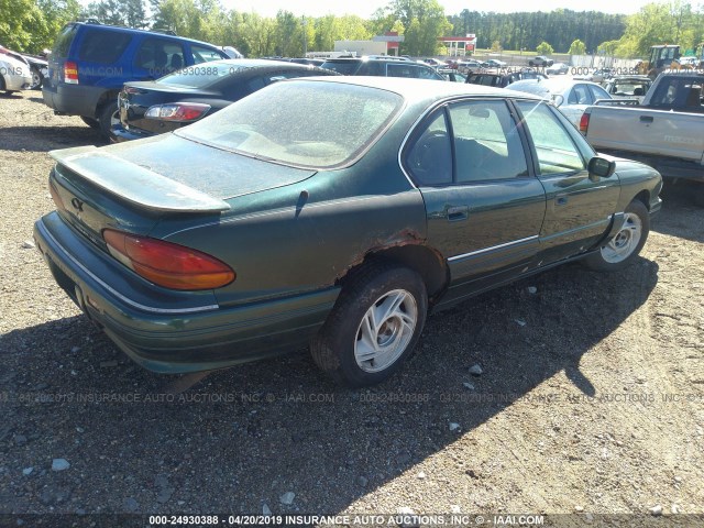 1G2HX53L8P1302856 - 1993 PONTIAC BONNEVILLE SE GREEN photo 4