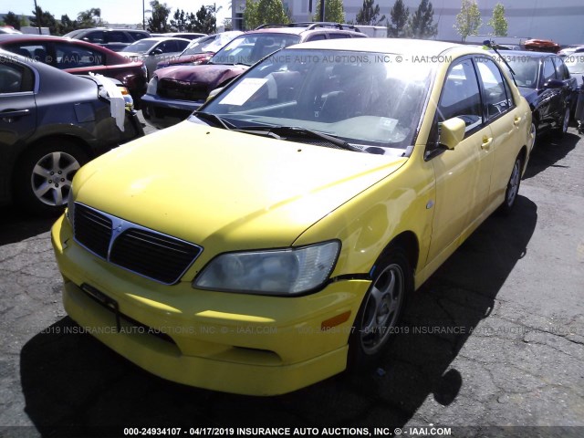 JA3AJ86E62U039883 - 2002 MITSUBISHI LANCER OZ RALLY YELLOW photo 2