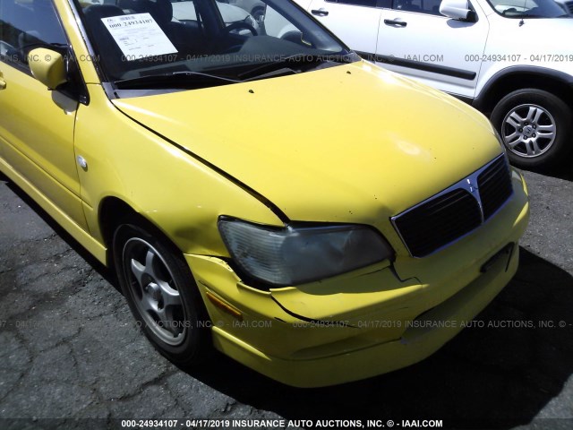 JA3AJ86E62U039883 - 2002 MITSUBISHI LANCER OZ RALLY YELLOW photo 6