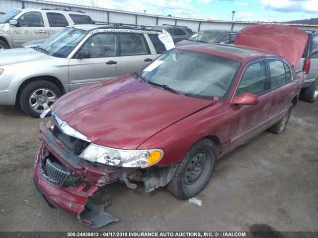 1LNHM97V3YY909176 - 2000 LINCOLN CONTINENTAL  BURGUNDY photo 2