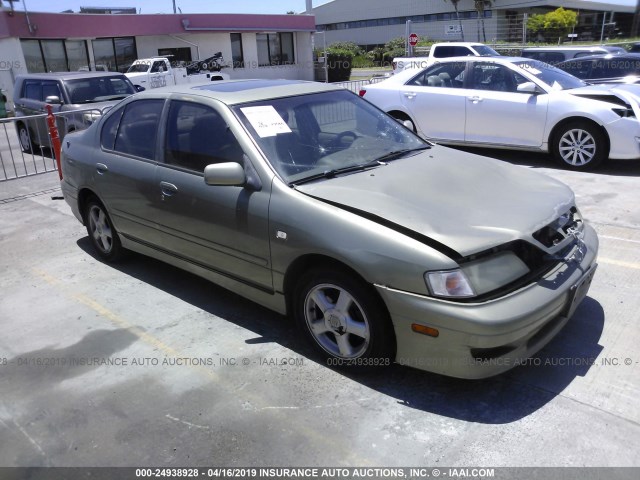 JNKCP11A71T405664 - 2001 INFINITI G20 GREEN photo 1