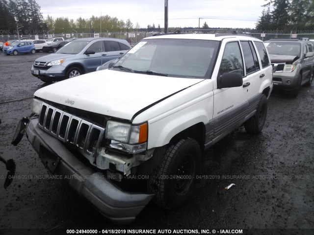 1J4GZ58S8VC747109 - 1997 JEEP GRAND CHEROKEE LAREDO/TSI WHITE photo 2