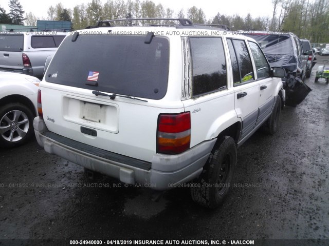 1J4GZ58S8VC747109 - 1997 JEEP GRAND CHEROKEE LAREDO/TSI WHITE photo 4