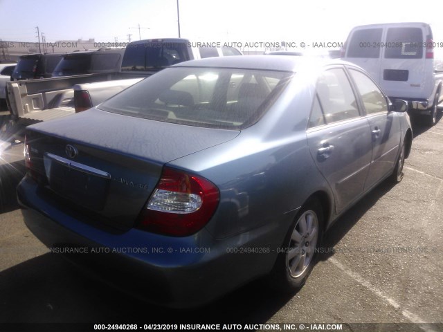 JTDBE32K520114699 - 2002 TOYOTA CAMRY LE/XLE/SE BLUE photo 4