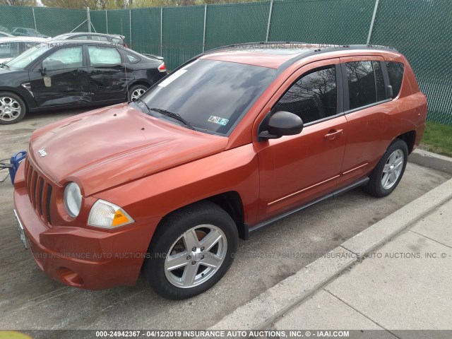 1J4NF4FB6AD510734 - 2010 JEEP COMPASS SPORT ORANGE photo 2