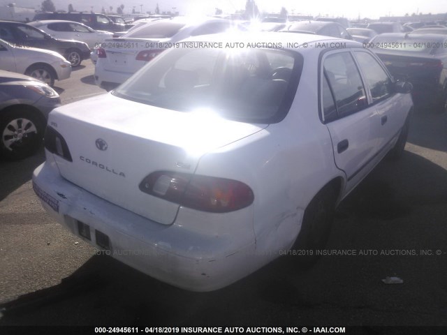 1NXBR12E0YZ315782 - 2000 TOYOTA COROLLA VE/CE/LE WHITE photo 4