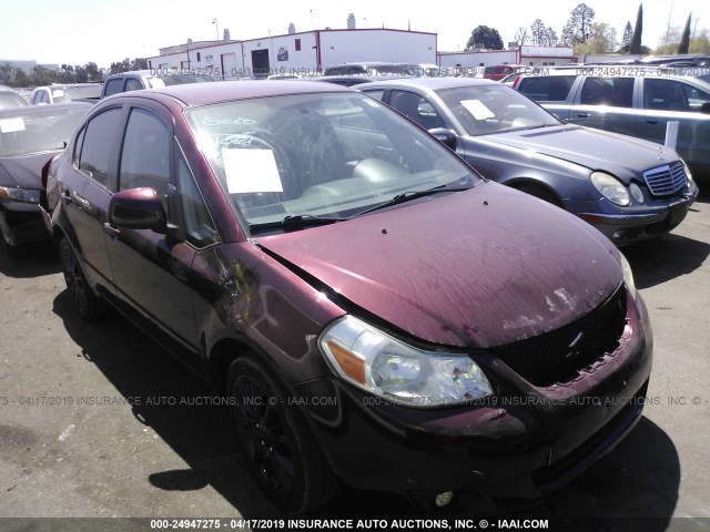 JS2YC5A27B6302351 - 2011 SUZUKI SX4 LE MAROON photo 1