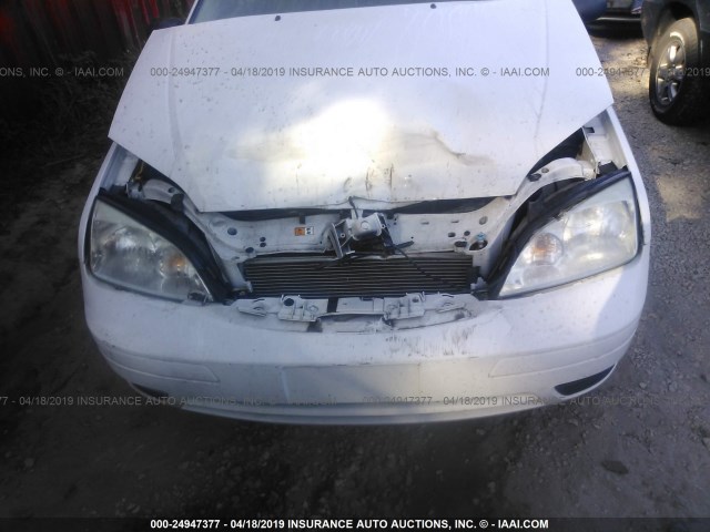 1FAFP34N95W313068 - 2005 FORD FOCUS ZX4 WHITE photo 6