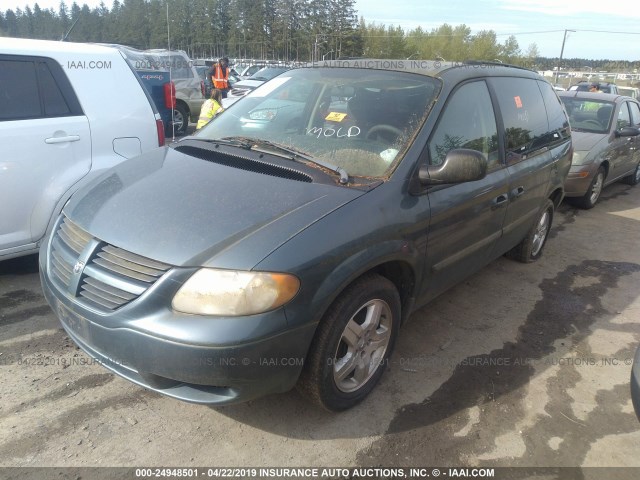 1D4GP45R75B204396 - 2005 DODGE CARAVAN SXT GREEN photo 2