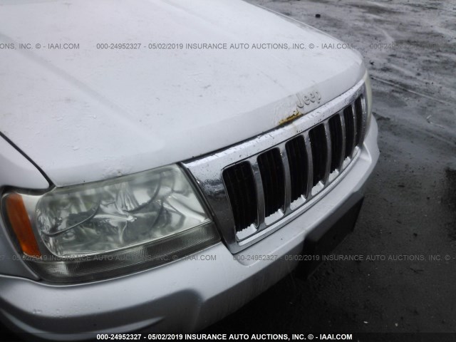 1J8GW68J64C348184 - 2004 JEEP GRAND CHEROKEE OVERLAND SILVER photo 6